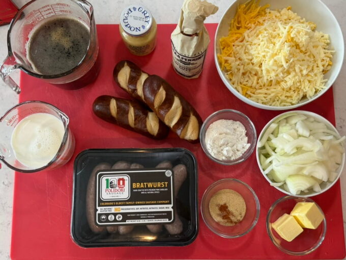 Food ingredients on a red cutting board.